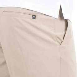 TravisMathew Starnes Shorts -Elite Golf Shop travismathew starnes shorts khaki logo itempicture